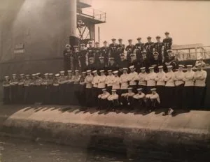 Ron Gordon and crew on side of submarine