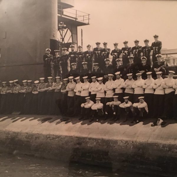 Ron Gordon and crew on side of submarine