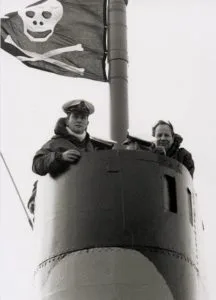 HMS Otus - on the bridge with Jolly Roger flag flying