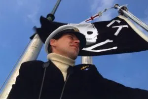 Splendid - Officer on bridge with Jolly Roger flying
