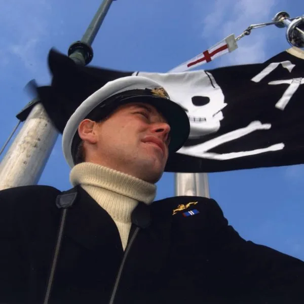 Splendid - Officer on bridge with Jolly Roger flying