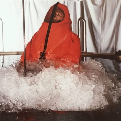 Man in escape suit popping out of top of SETT - Brian Wood